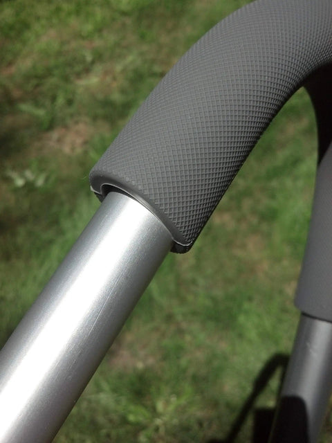 Close-up of Heavy Duty Ladder Stabilizer Standoff Brackets with Silicone Elbows fitting on a metal ladder rail outdoors