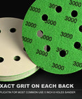 Close-up of 3000 grit, 5 inch, 8-hole sanding discs from 120 Pcs 5 Inch Sanding Discs Hook And Loop 8 Holes Wet Dry Grit 320 400 600 800 1000 2000 3000 With 2 Interface Pads Silicon Carbide Round Sandpaper Pro Grade Kit For Wood Metal Plastic Finishing