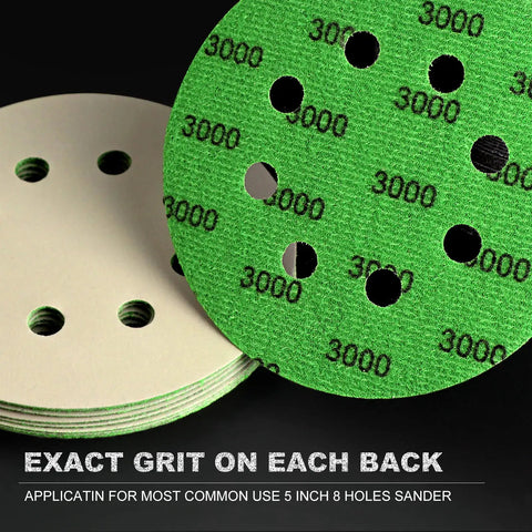 Close-up of 3000 grit, 5 inch, 8-hole sanding discs from 120 Pcs 5 Inch Sanding Discs Hook And Loop 8 Holes Wet Dry Grit 320 400 600 800 1000 2000 3000 With 2 Interface Pads Silicon Carbide Round Sandpaper Pro Grade Kit For Wood Metal Plastic Finishing