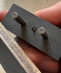 Heavy Duty Self Centering Scribe Equipped With Tungsten Carbide Pin And Hardened Steel Guide Locks Tight Precision Layouts For Knife Makers Smooth Operator Design, showing metal pins and guide in use.