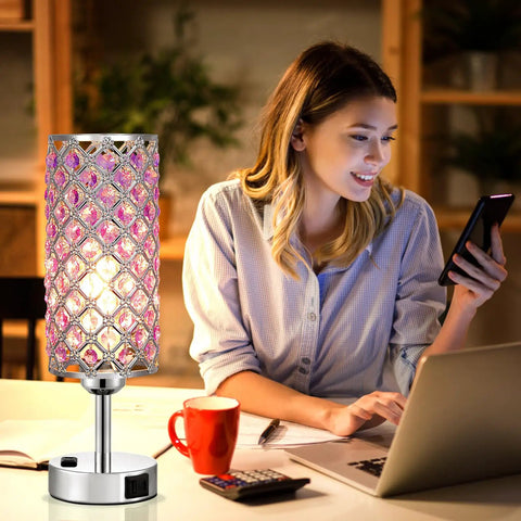 Rose Gold Crystal Touch Lamps Set Of 2 With Dual USB Ports, 3 Way Dimmable Nightstand Lights beside woman using phone at desk