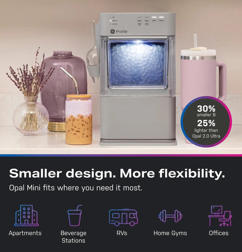 Legit Nugget Ice Maker on countertop next to drinks, showcasing the sleek stone grey design and compact size.