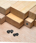 Badass Eight Piece Carbon Steel Dowel Transfer Pin Kit For Woodworker Pros Who Want To Nail Center Marking Exactly And Align Boards Perfectly For Rock Solid Joints Using Plated Steel Centers To Drill Matching Holes Fast On Any Diy Project. Black carbon steel dowel transfer pins on wood boards