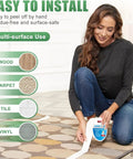 Person installing Heavy Duty Double Sided Carpet Tape For Rugs And Floors 2 Inch By 20 Yards Removable Adhesive on carpet