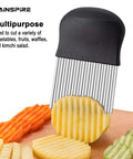 Rainspire crinkle cutter with black handle and stainless steel blades, front view cutting a potato.