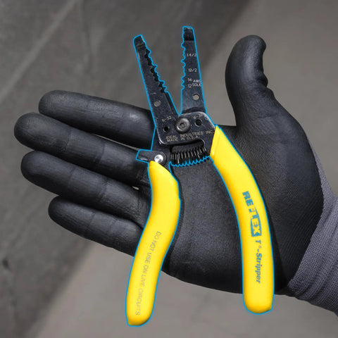 Reflex Super NM Cable Stripper For 12/2 And 14/2 Solid NM Wire in gloved hand, plier nose, yellow textured grip, dual stripper heads