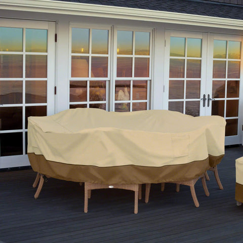 Water Resistant 108 Inch Rectangular Oval Patio Table And Chair Cover With Bound Seams High Density Stitching Padded Handles And Matching Webbing Fits 108 Inch Long 82 Inch Wide 23 Inch High Tables And Six Chairs Two Year Warranty covering patio furniture