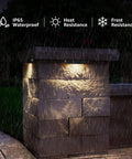 7 Inch Hardscape Led Wall Lights, 5W Outdoor Step And Retaining Wall Lighting on wet stone wall at night, 270 Degree Adjustable Direction