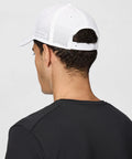 Moisture-Wicking Dri-Fit ADV Club Structured Swoosh Cap With AeroBill Breathability For Dry Comfort All Day White Black Small Medium viewed from back showing vented design