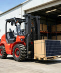 Heavy Duty Electric Stacker Forklift For Busy Warehouses Compact Pallet Lifter lifting large solar panel box in a warehouse.