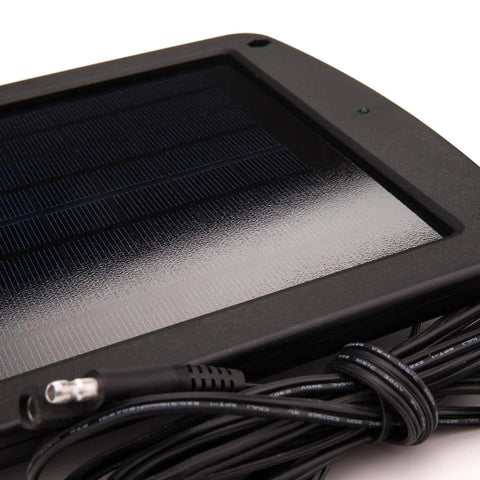Close-up of Five Watt Solar Panel 12V Battery Charger with Charge Controller IP67, showing the panel surface and output cord connector.