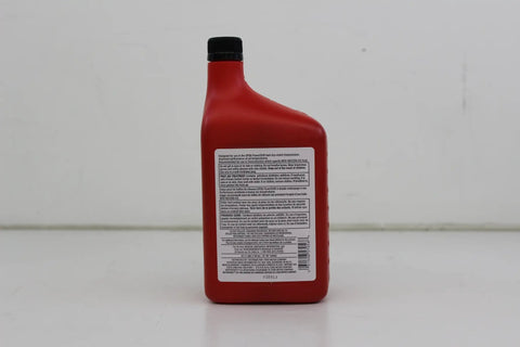 Back of Ford XT-11-QDC Dual Clutch Transmission Fluid For DPS6 Twin Dry Clutch Systems, 1 Quart bottle with label details visible.