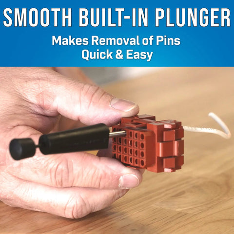 Hand using R-5926 Pin Extractor For AMP CPC Connectors Sizes Sixteen To Twenty, Three Inch Length for quick pin removal.