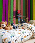 Wall Mural Peel And Stick Self Adhesive Removable Large Wall Decor Scene Of Agricultural Crops Sprayer In A Tulip Field With Springtime View For Kids Room Bedroom And Living Room 69 By 96 Inches displayed in a vibrant children's bedroom with toys.