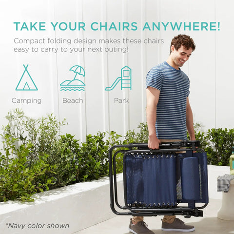 Man carrying foldable Set Of 2 Adjustable Zero Gravity Lounge Chairs With Steel Mesh, Pillows, And Cup Holder Trays, Black, for portability at park or beach.