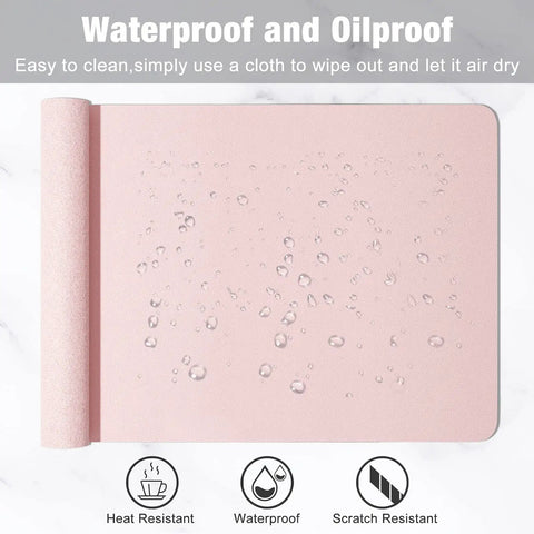 Pink Desk Pad 30x14 Inch PU Leather Desk Mat Waterproof Non Slip Ultra Thin XL Extended Mouse Pad on marble surface
