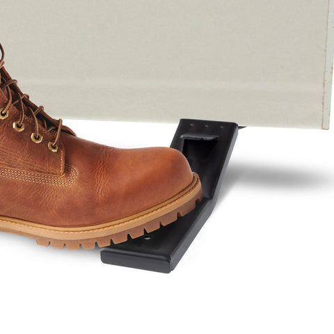 Rock Solid Drywall Foot Lifter for Standard Sheetrock Panels in use with a work boot lifting drywall easily.
