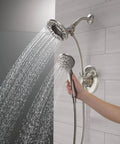 Linden 17 Series Dual Function Shower Faucet Kit With 4 Spray In2ition 2 In 1 Handheld Shower Head And Hose Stainless Finish T17293 SS I Valve Not Included displayed in modern bathroom.