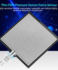 S40 ST thin film pressure sensor pad with interdigitated white traces and a three-wire connector for intelligent seat