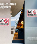 No Smoking Sign 10 By 14 Inch Aluminum Sign With Screen Printed Symbol 40 Mil Laminated Rustproof Aluminum For Indoor Outdoor Use Made In USA Easy Mount With Corner Holes displayed indoors and outdoors mounted on walls.