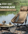 Tigerblade High Back Camping Chair With Pillow Design Ultra Comfy Widened Seat Foldable Outdoor Chair next to a lake.