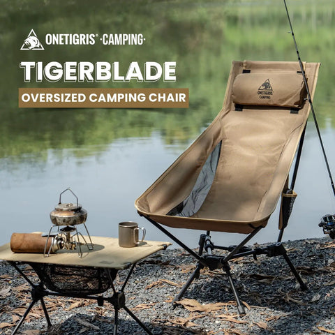 Tigerblade High Back Camping Chair With Pillow Design Ultra Comfy Widened Seat Foldable Outdoor Chair next to a lake.