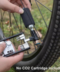 Compact Bicycle Multi Tool With CO2 Inflator And Chain Tool For Road And Mountain Bikes Torx Hex Screwdriver Set in use