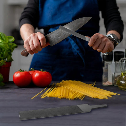 Person sharpening knife with 6 Inch Flat File Double Cut Teeth High Carbon Steel Hardened Without Handle Pro Grade