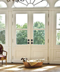 Double doors with Matte Black Entry Door Lock Set With Deadbolt And Straight Handle, dog in basket near classic chair