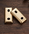 Towel Rack Mounting Hardware Kit For Stainless Steel Bracket Replacement Parts with gold finish on wooden surface