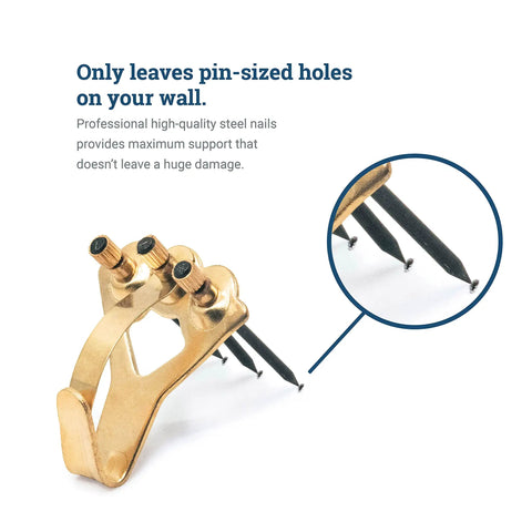 Close-up of gold heavy duty picture hangers for drywall and plaster walls with nails, 75 lb earthquake proof hooks.