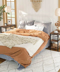 Rustic Brown And Black 3 Tier End Table With Open Storage Shelves Sleek Industrial Side Stand Fits Snugly In Tiny Spaces next to a bed.