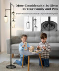 Industrial Dimmable Floor Lamp With Three Light Tree And Metal Cage Shades Farmhouse Vibe Tall 71 Inch Pole Lamp in living room with children playing, LED Edison bulbs included, black.