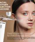 Rechargeable Handheld High Pressure Facial Micro Nano Mist Injector Sprayer Portable Cordless Spray Gun in use on model