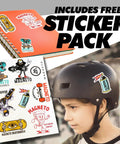 Child wearing helmet with Magneto skateboard stickers, featuring skateboard images and text "Includes Free Sticker Pack"