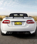 Legit Real Carbon Fiber License Plate Frame With Glossy 3D Twill Finish For Cars And Trucks, shown on a white convertible rear.