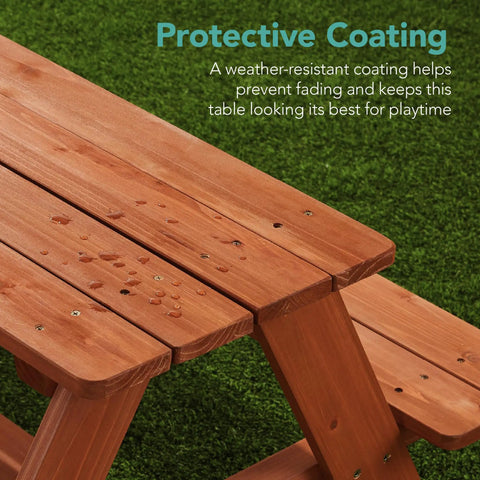 Close-up of Wooden Kids Picnic Table With Umbrella For Backyard Play And Outdoor Fun Activity Table Set showing protective coating.