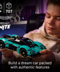 Child with Aston Martin Valkyrie Dope Building Kit For Kids 9 Plus With Realistic Engine And Working Gears STEM Toy Car