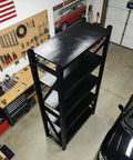 Heavy Duty Multi Tier Storage Rack And Adjustable Metal Shelving Unit For Garage Organization Built Tough With Rock Solid Modular Frame Quick No Sweat Setup Handles 1800 Pounds, overhead view in garage.