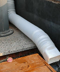 Two Pack Flexible Rain Gutter Downspout Extensions Extendable From 21 To 60 Inches With Split Design Drain Diverter in use