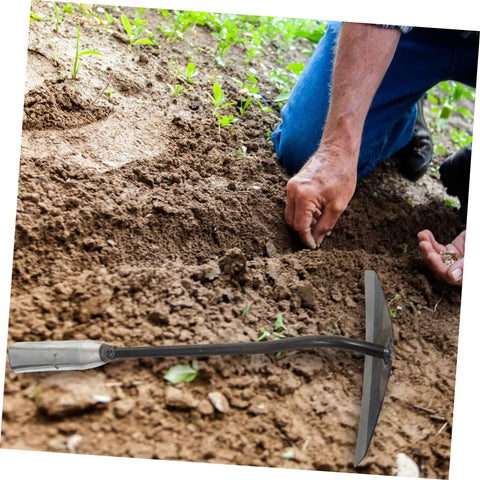 Gardener using Two Pack Steel Hand Hoe Set For Weeding And Gardening in soil, highlighting manual tool's effectiveness for backyard projects.