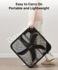 Person carrying 20 Inch Box Fan With 3 Speeds For Window Floor Or Tabletop Use Lightweight 5 Blade Design Delivers Up To 2295 CFM