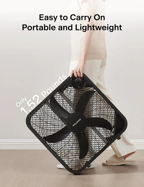 Person carrying 20 Inch Box Fan With 3 Speeds For Window Floor Or Tabletop Use Lightweight 5 Blade Design Delivers Up To 2295 CFM