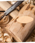 Close-up of 100 PC Wood Biscuits For Woodworking Pro Grade Slotting And Plywood Joinery Tool on wooden block