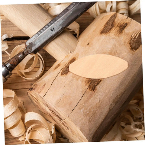 Close-up of 100 PC Wood Biscuits For Woodworking Pro Grade Slotting And Plywood Joinery Tool on wooden block