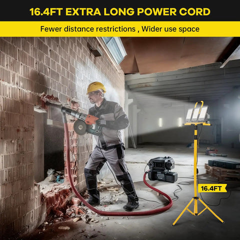 Heavy Duty Led Work Light With Beefy Telescoping Tripod, 30000 Lumens, Three Pivotable Heads, Waterproof Housing, And Badass 16 Ft Power Cable For Projects in use on construction site