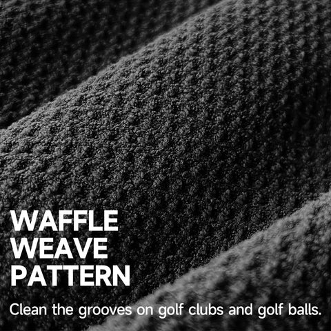 Close-up of black microfiber waffle weave pattern from Two Black Microfiber Waffle Golf Towels With Retractable Club Brush Pro Grade Clean Up
