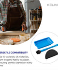 Built Different Non Stick Silicone Glue Brush Set With Tray And Spreader Tool, blue applicator set on woodworking table.