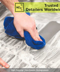 Person cleaning surface with cloth and Heavy Duty All Purpose Cleaner For Cars And More, Ultra Concentrated Multisurface Cleaner