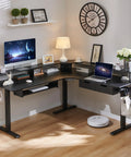 60 Inch L Shaped Electric Standing Desk With Height Memory, Boss Level Corner Gaming Desk, Carbon Fiber Black in home office
